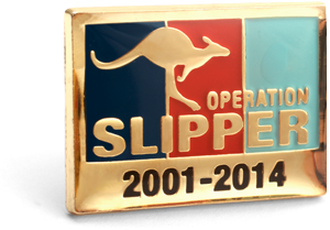The rectangular Operation Pin is showing the tri-service colours of navy blue, red and light blue in vertical stripes set in a Gold plate face with a leaping kangaroo in Gold and words Operation Slipper printed over. The dates 2001 - 2014 sit at the bottom of the lapel pin face.