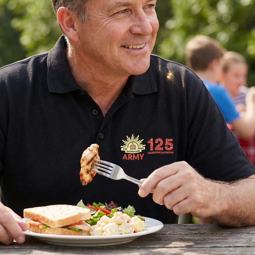 Australian Army 125th Anniversary Desk Paper Weight on a Desk