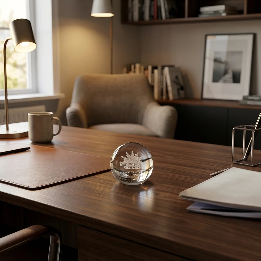 Australian Army 125th Anniversary Desk Paper Weight on a Desk