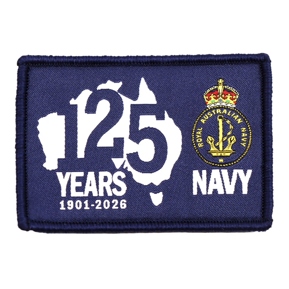 Royal Australian Navy 125th Anniversary Desk Paper Weight on a Black Background